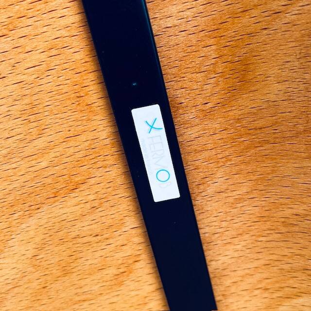 Pair of wooden and black metal chairs