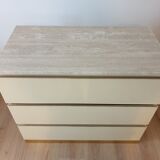 Chest of drawers with travertine