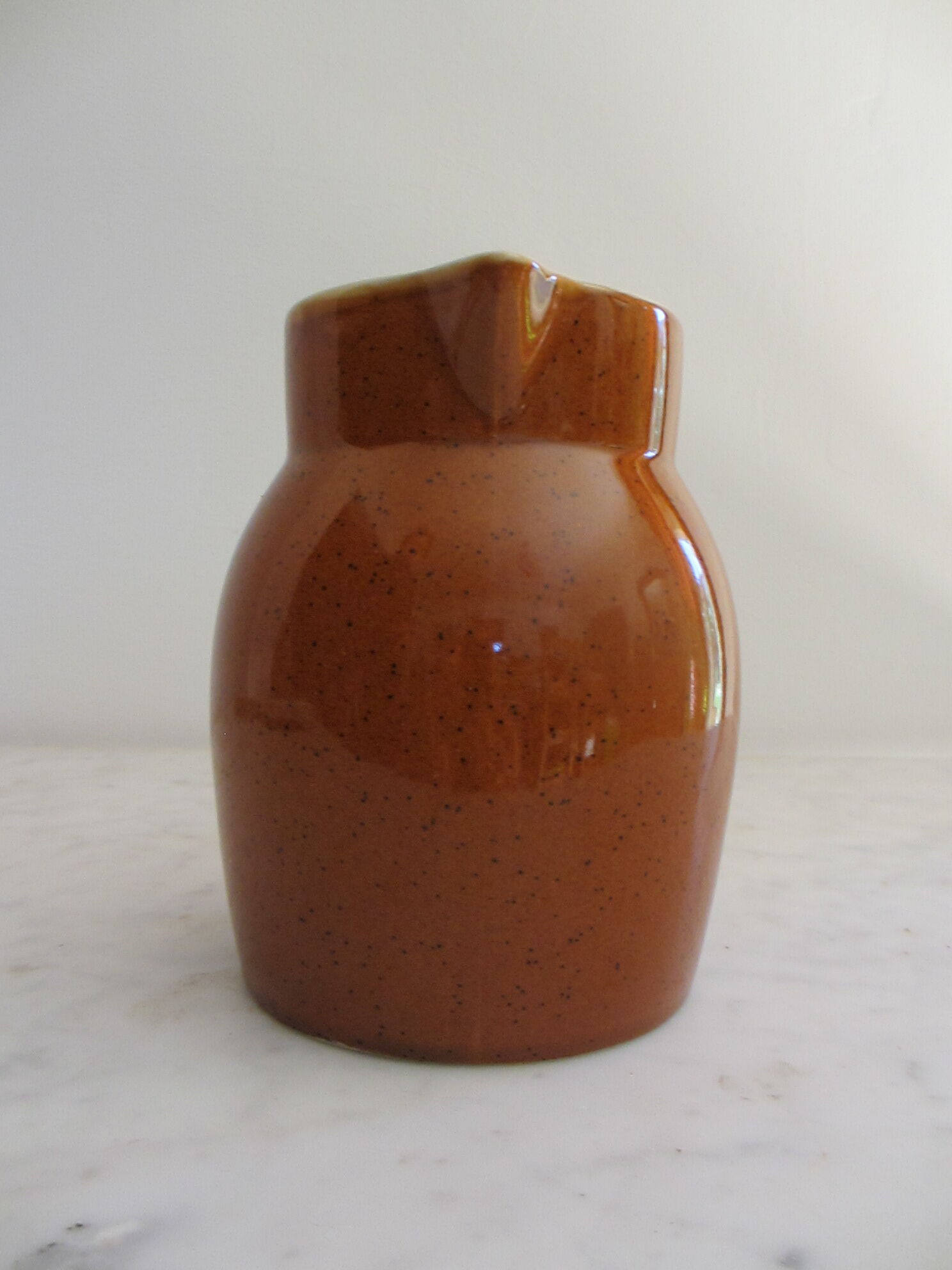 Ceramic pitcher from the Digoin factory.