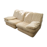 Deux fauteuils chauffeuses Cinna beige modèle Gao