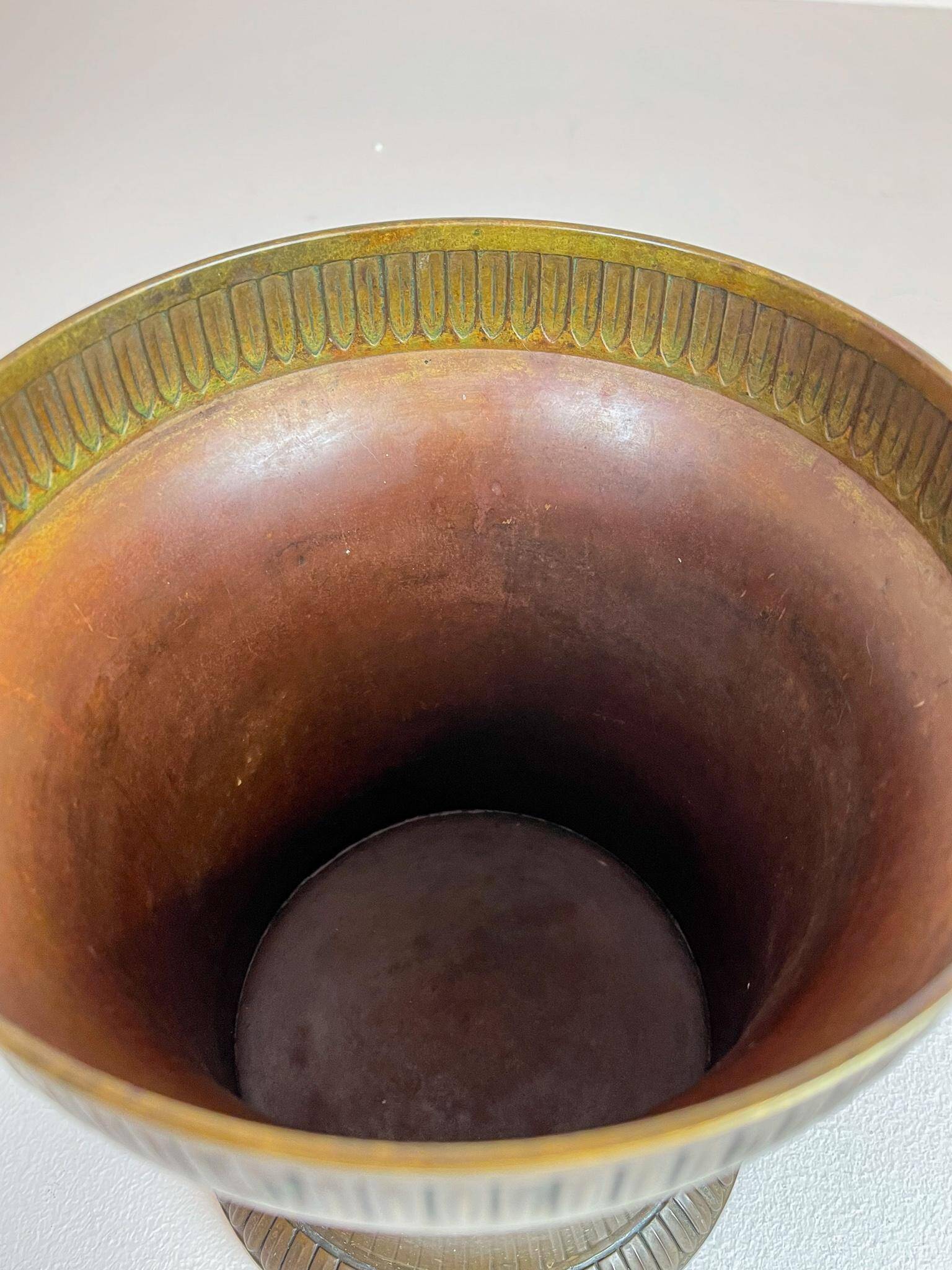 Art Deco champagne cooler in copper and brass with relief patterns, Sweden, 1930s.