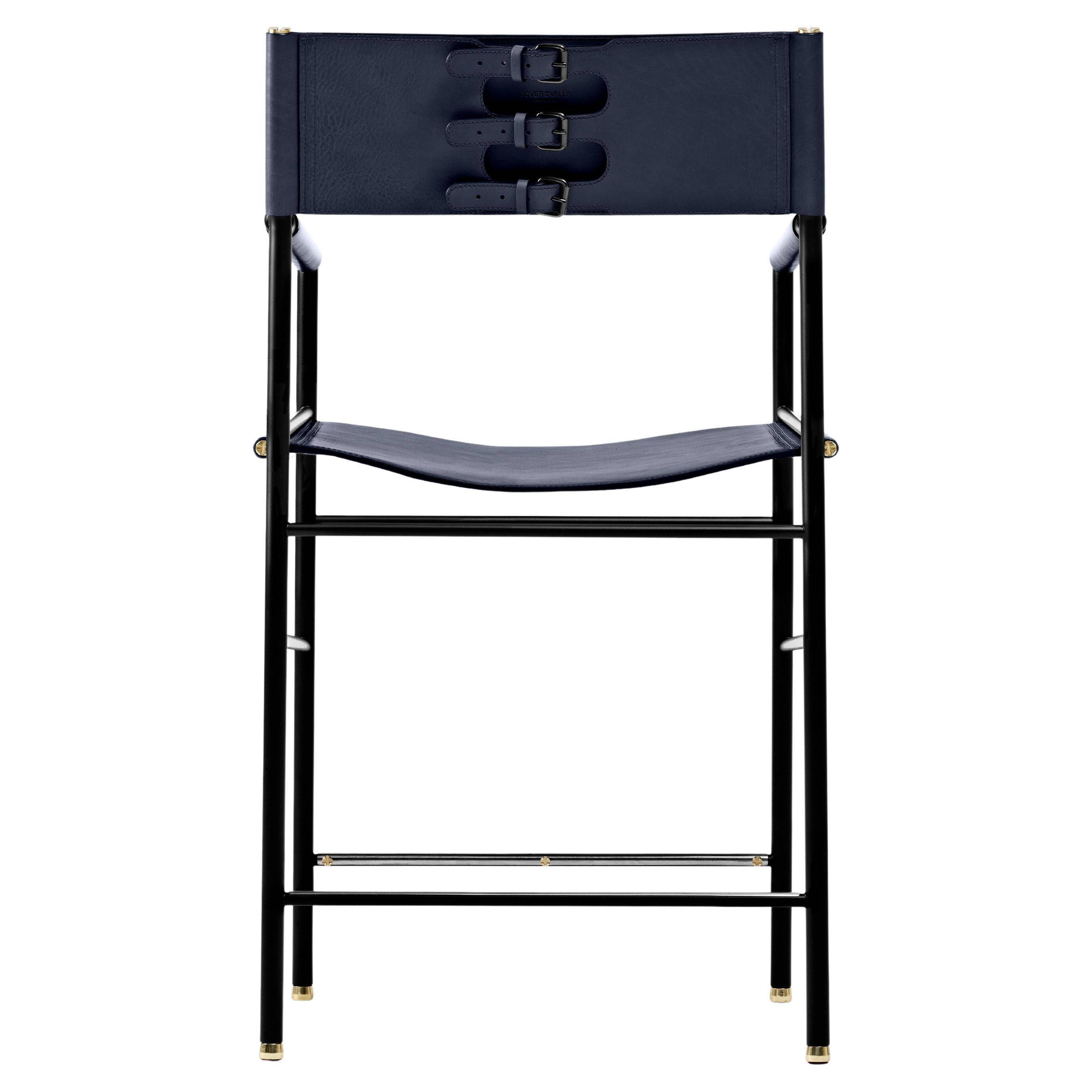 Timeless bar stool with a navy blue leather backrest and black metallic rubber.
