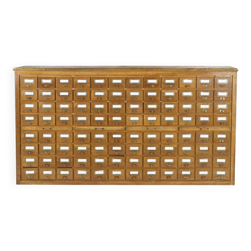 Large wooden apothecary cabinet with 96 drawers