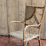 Asymmetrical rattan armchair