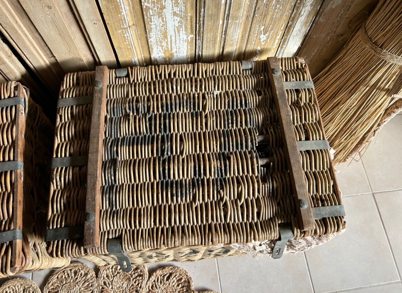 Old wicker moving trunk
