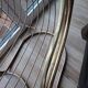 Tubular metal chair covered with gilding
