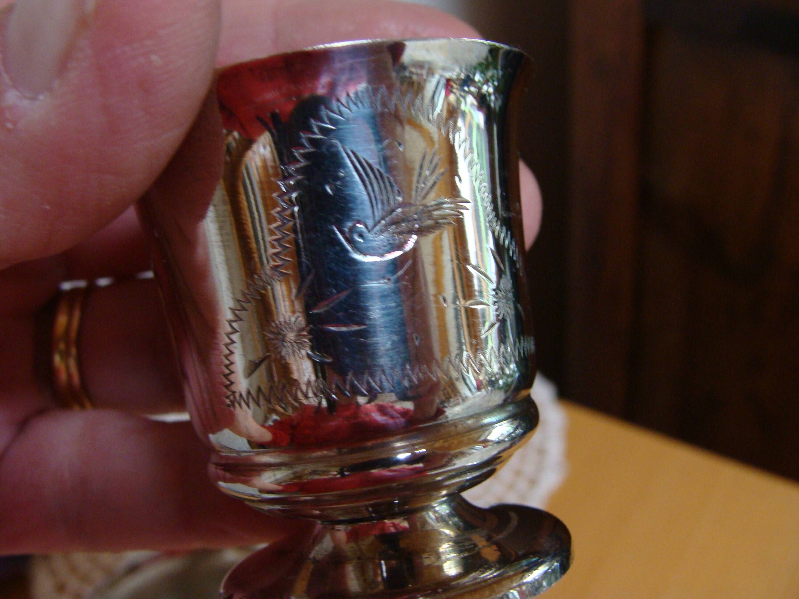 Timbale and egg cup set in silver.