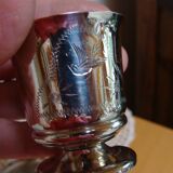 Timbale and egg cup set in silver.