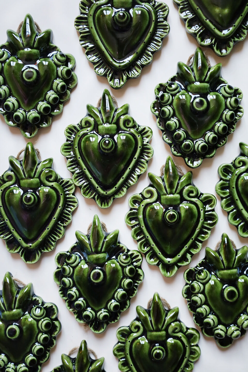 Decorative heart in green ceramic "pearls"