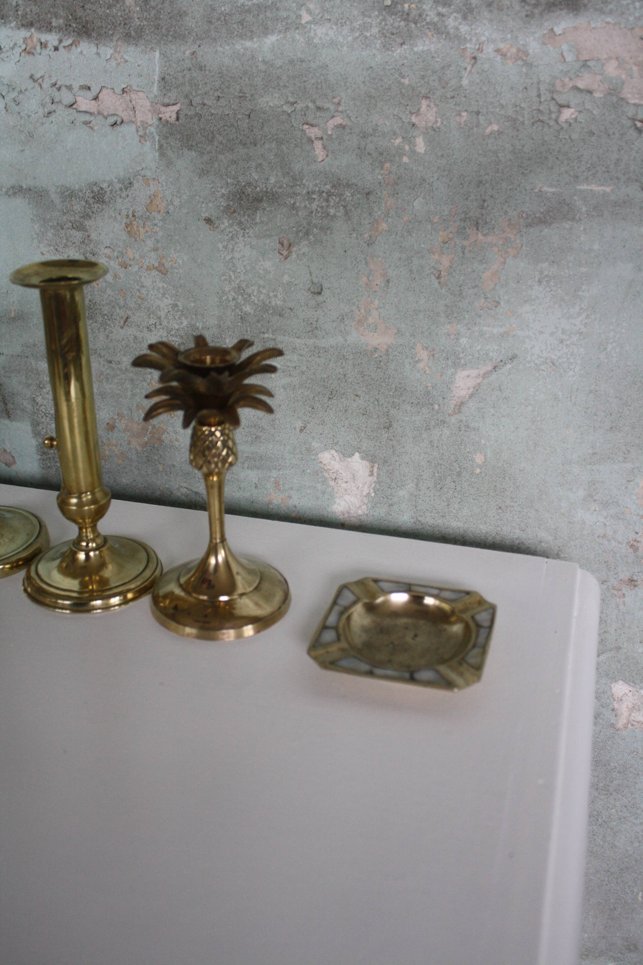 Pair of brass push-up candlesticks