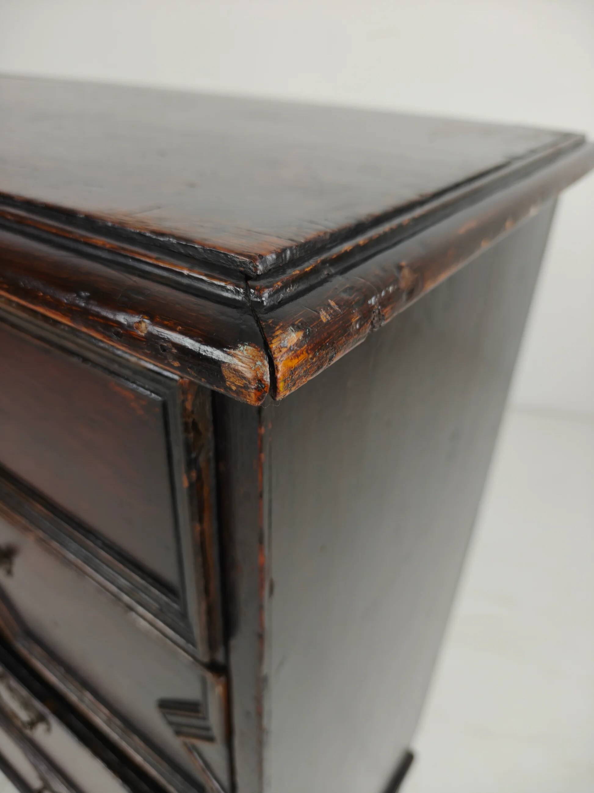 English geometric-panelled oak chest of drawers, circa 1680