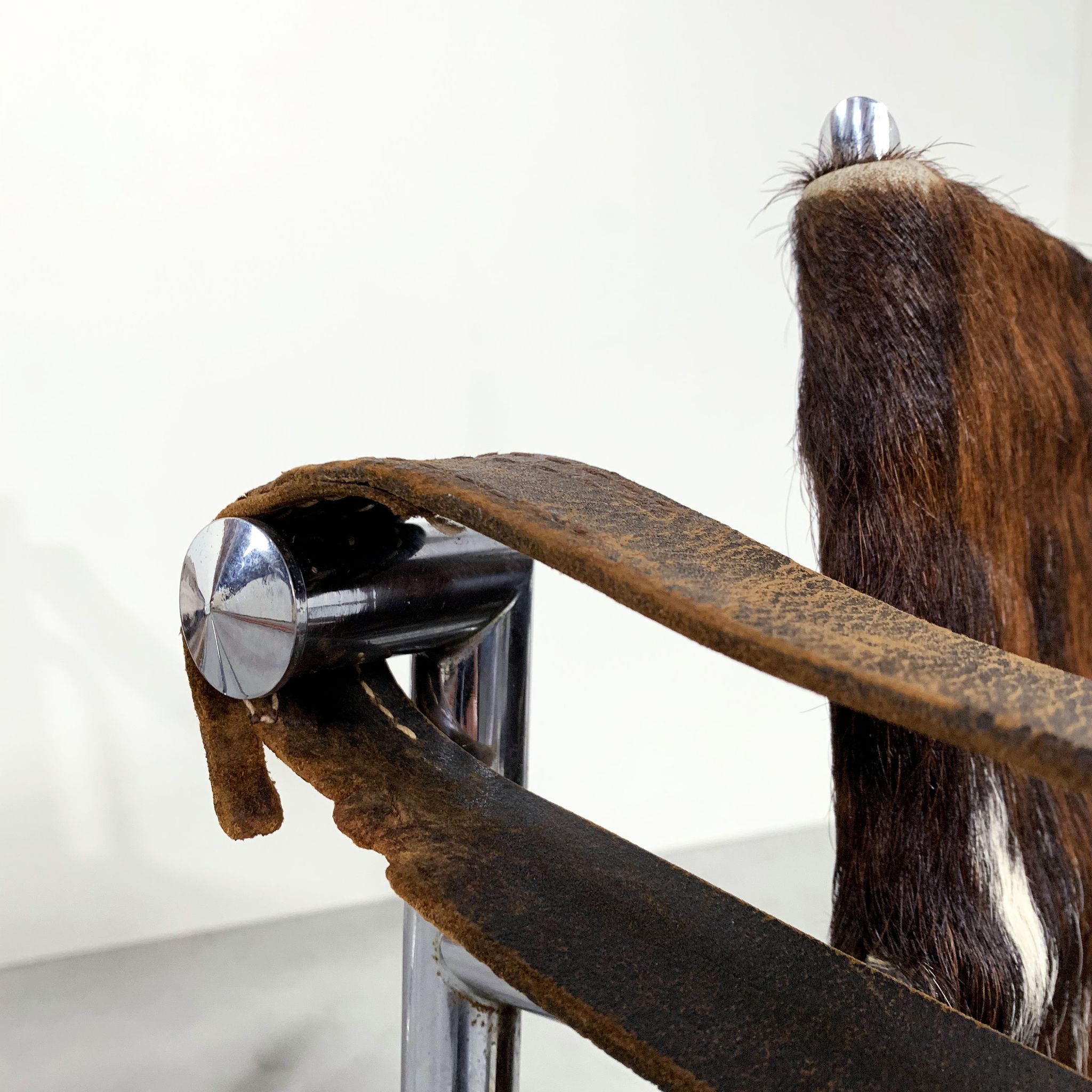 Pair of LC1 cow skin chairs by Le Corbusier for Cassina 1970