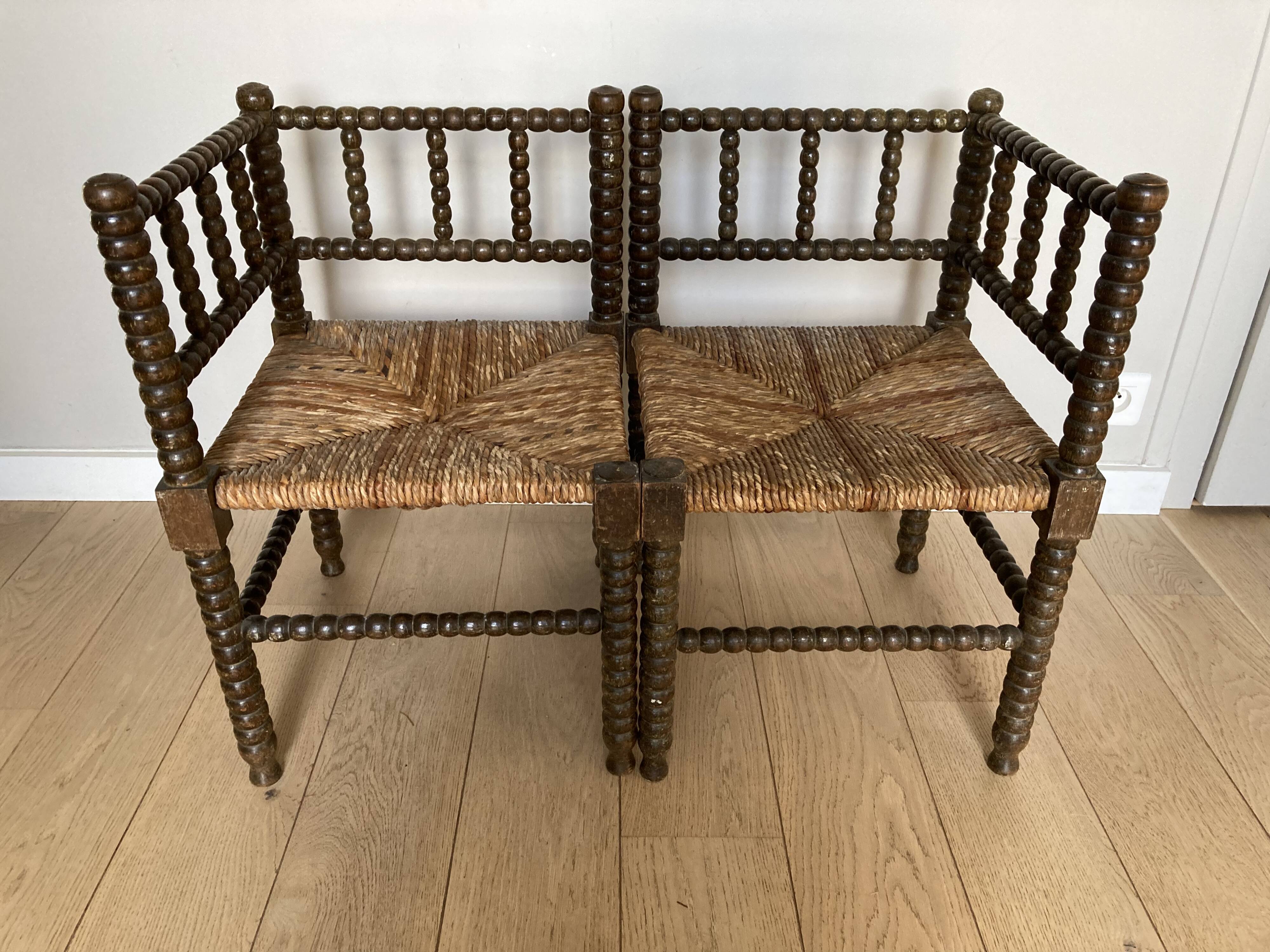 Turned wood corner armchairs