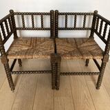 Turned wood corner armchairs