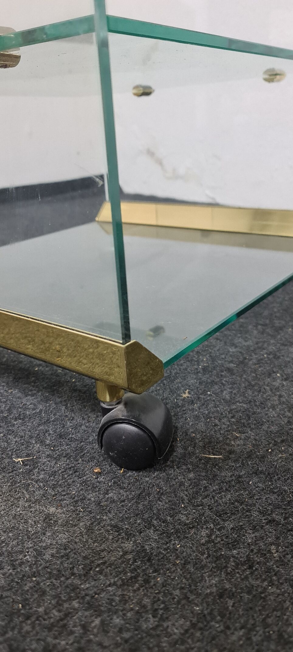 Vintage glass sidetable on wheels