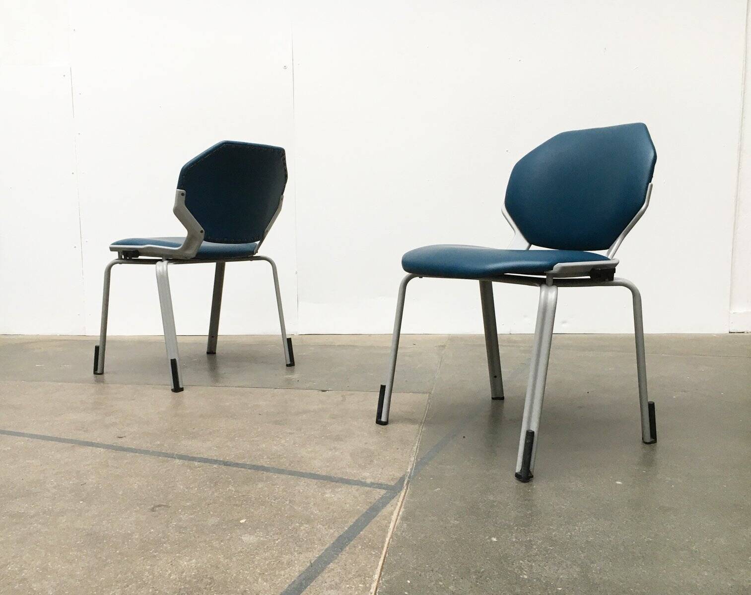 Stackable vintage leather dining chairs from the German space age by Fröscher, 1970s, set of 2.