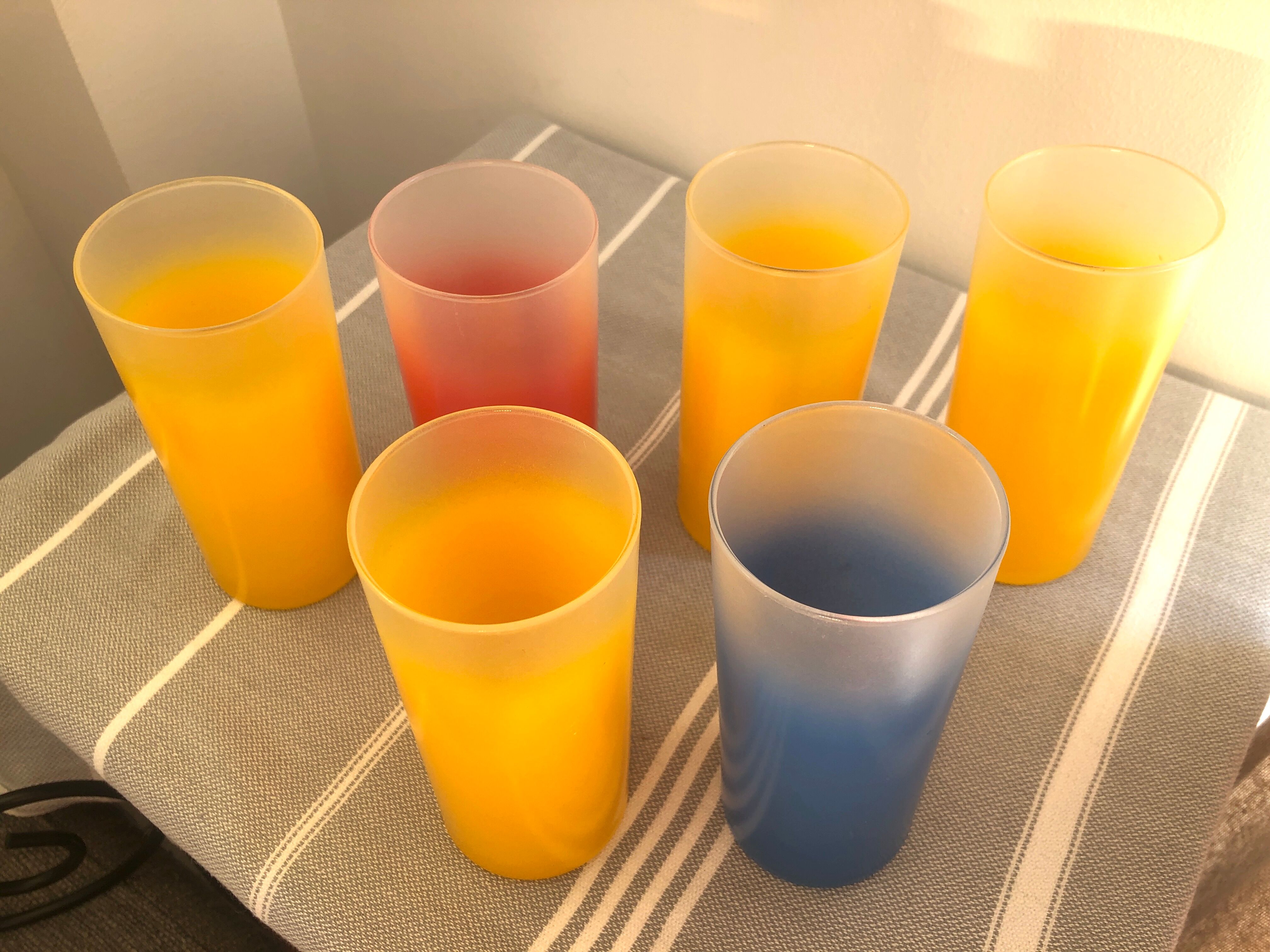 Yellow, red and frosted yellow orangeade glasses made of vintage glass