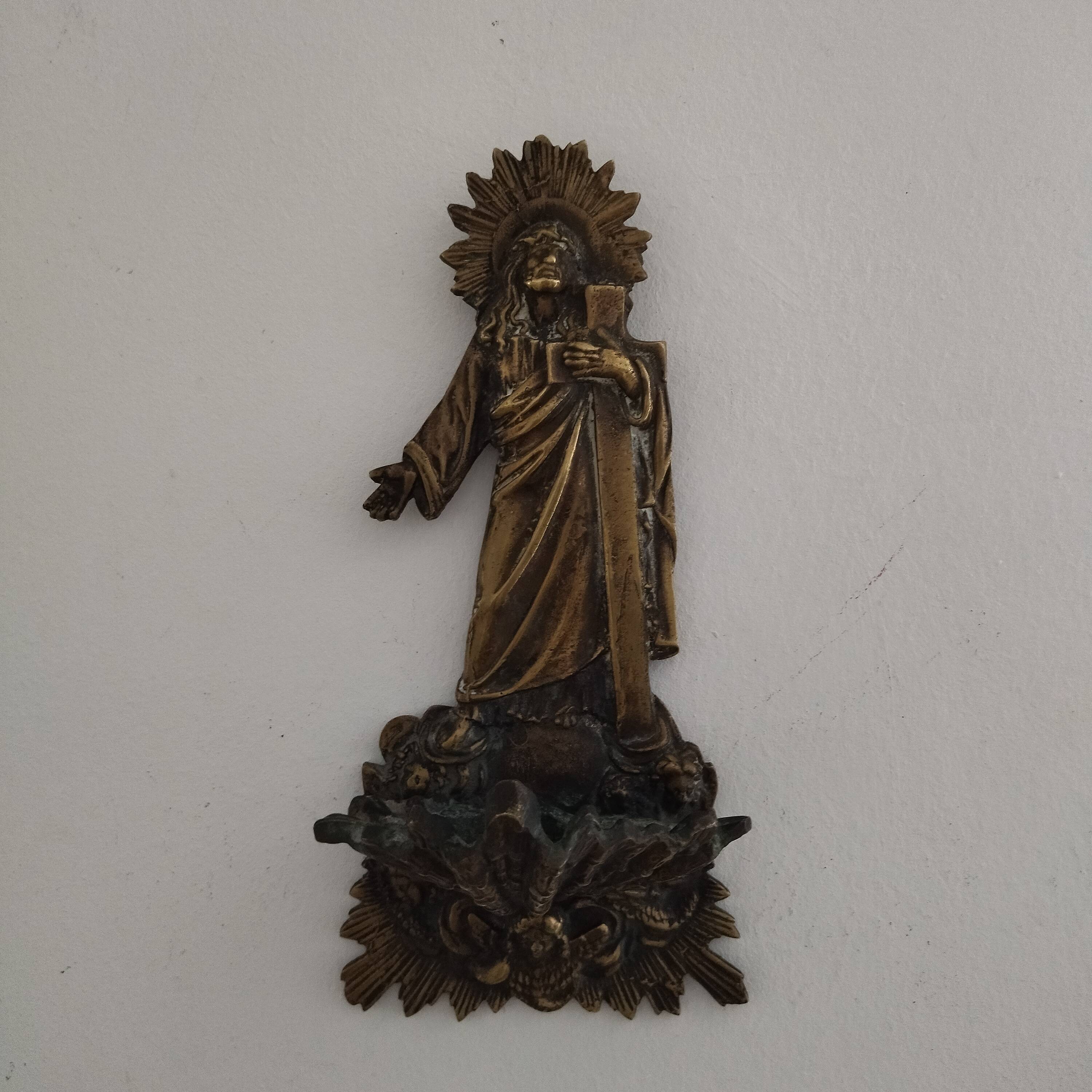 Antique bronze holy water font