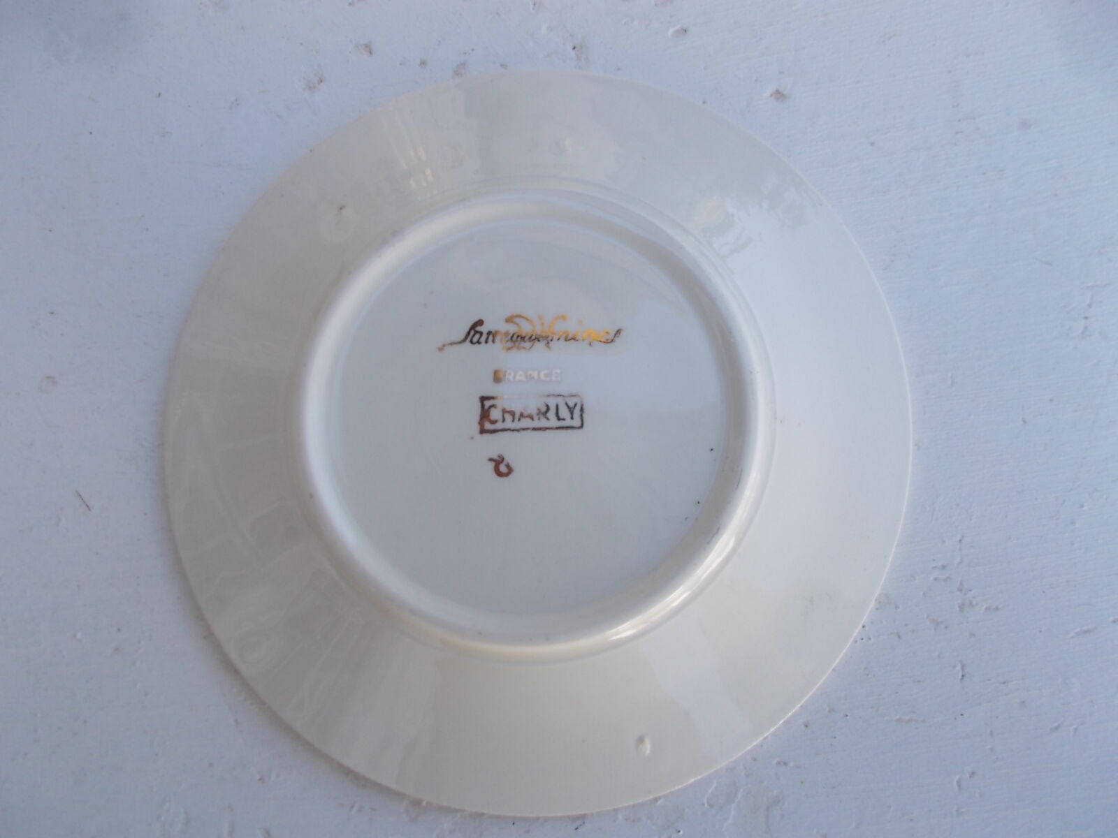 Lot of 10 Sarreguemines cups and saucers.