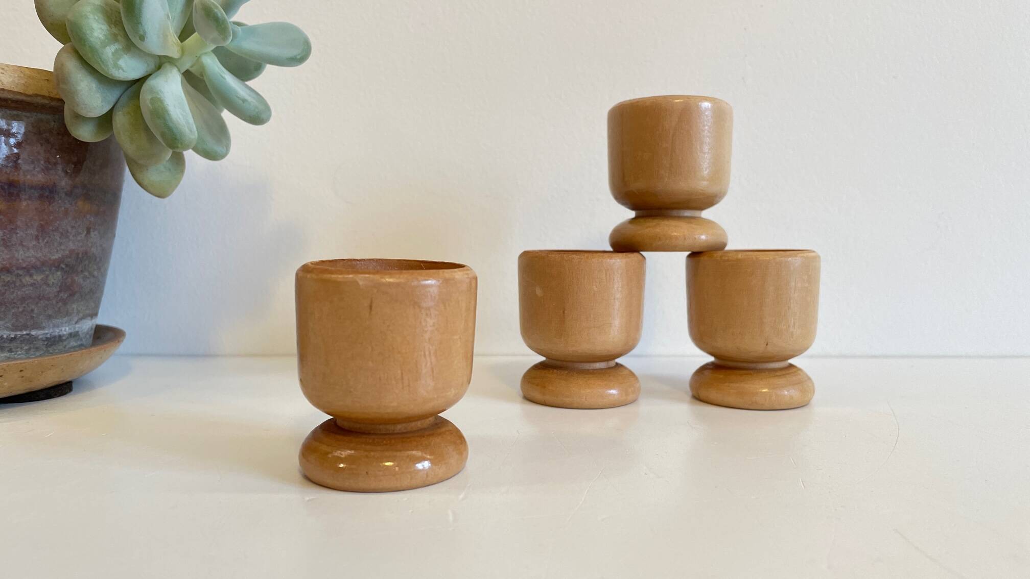 4 vintage turned wooden egg cups