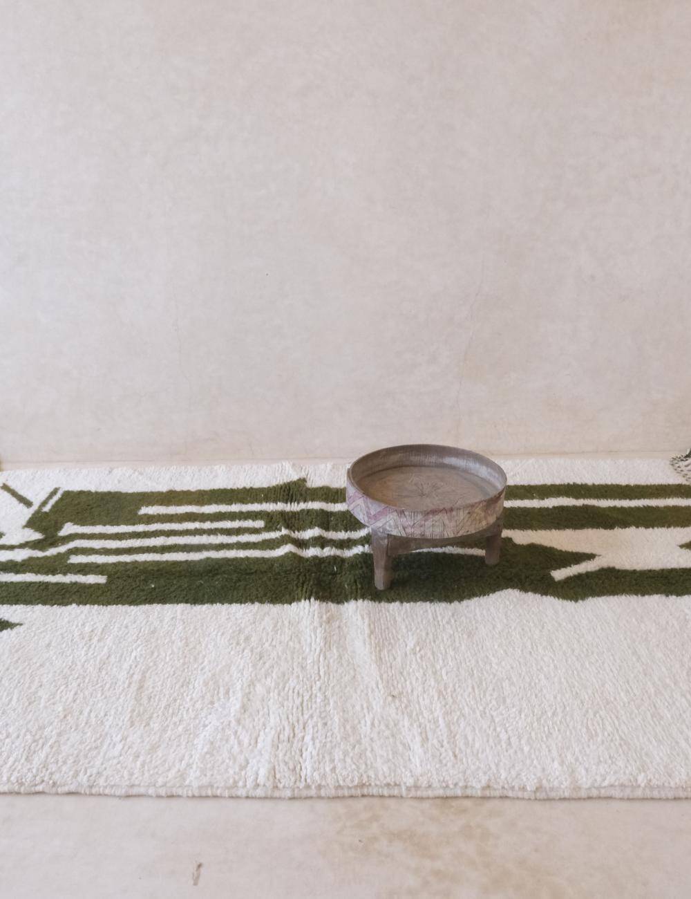 Tapis contemporain vert abstrait
