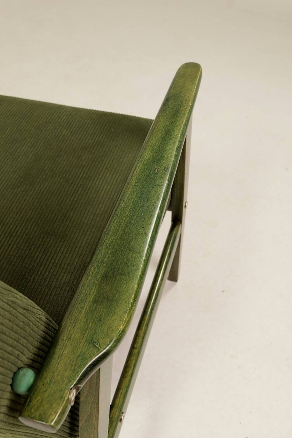 Scandinavian armchair deep olive green 1970s Boho style