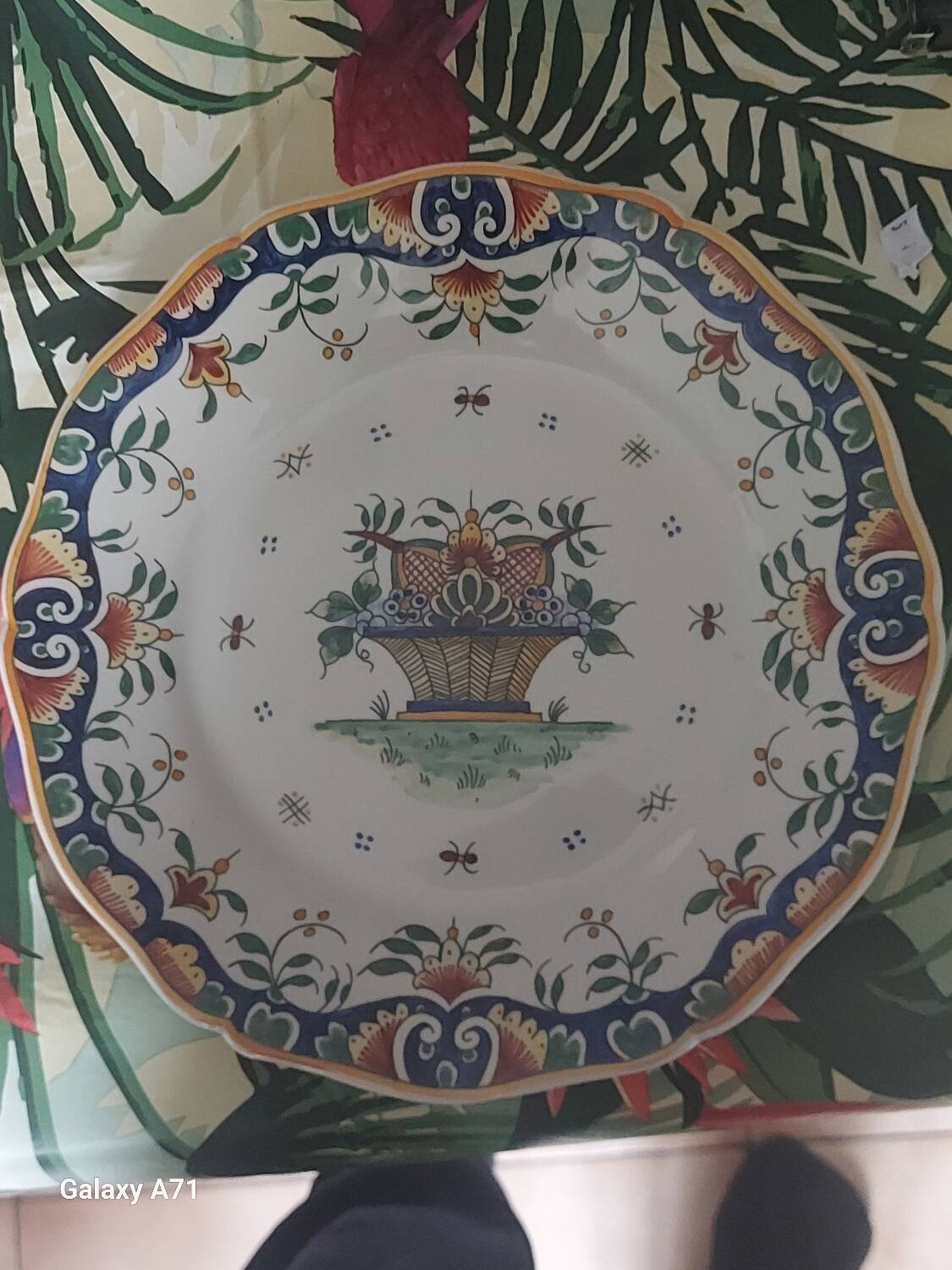 Faience plate from Desvres, Rouen decoration, signed René Delarue.