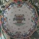 Assiette en faience de Desvres decor Rouen signé René Delarue