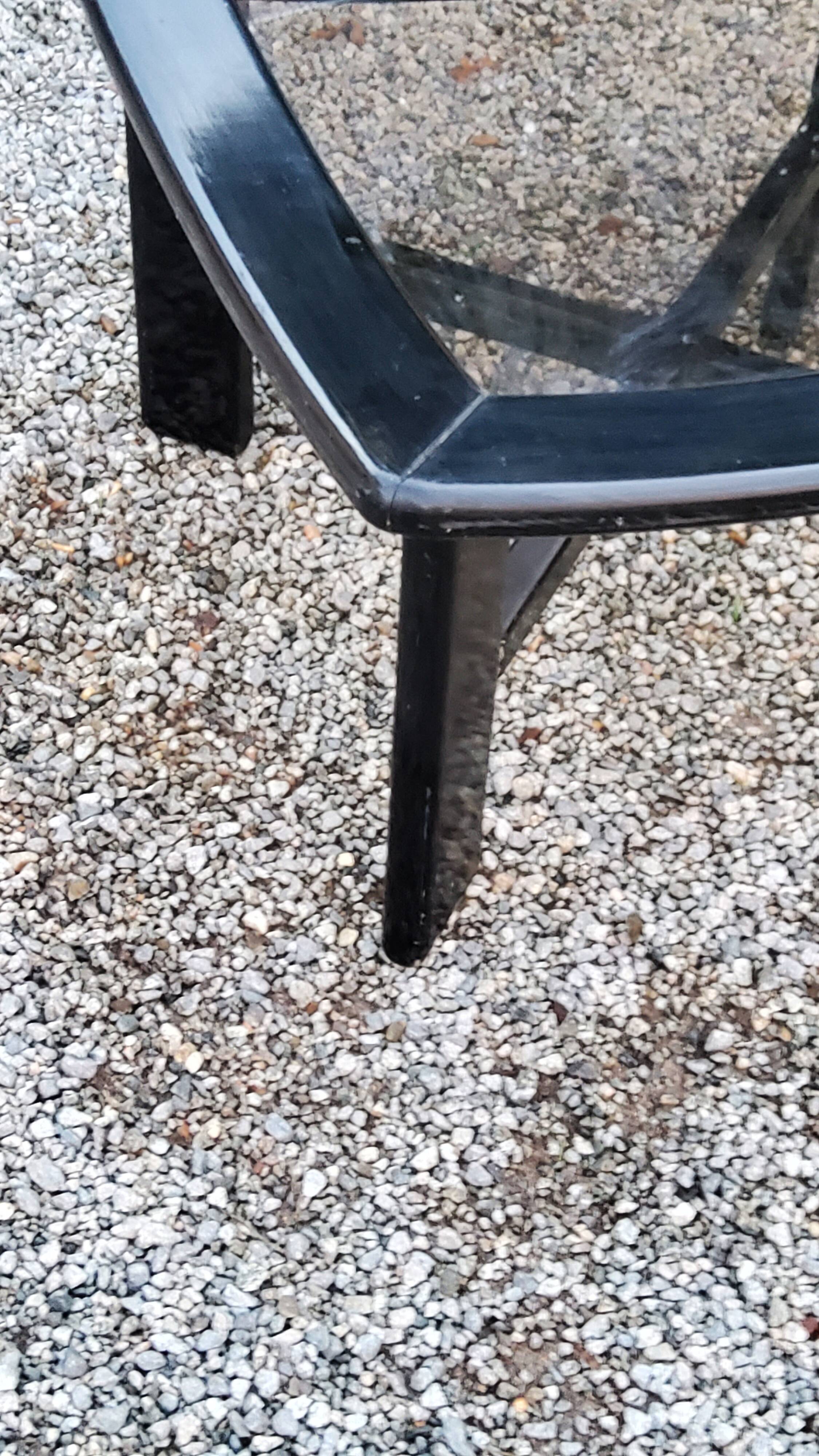70s design coffee table in black lacquered wood with smoked glass top