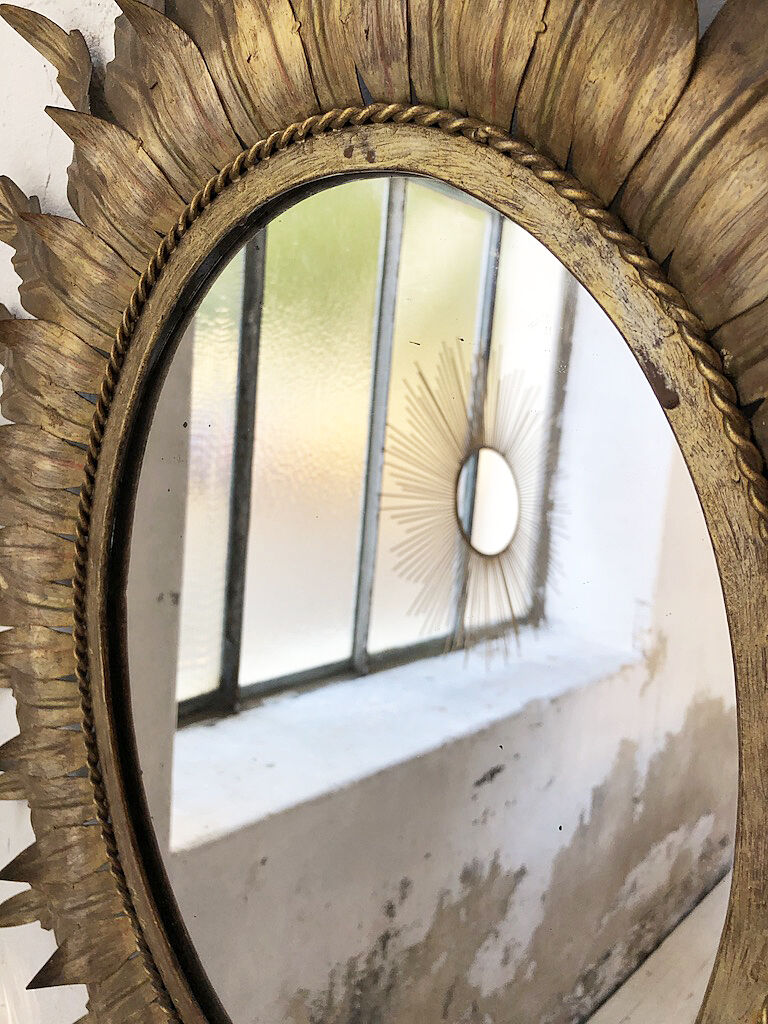 Golden mirror ancient flowery sun