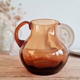 Antique amber glass pitcher