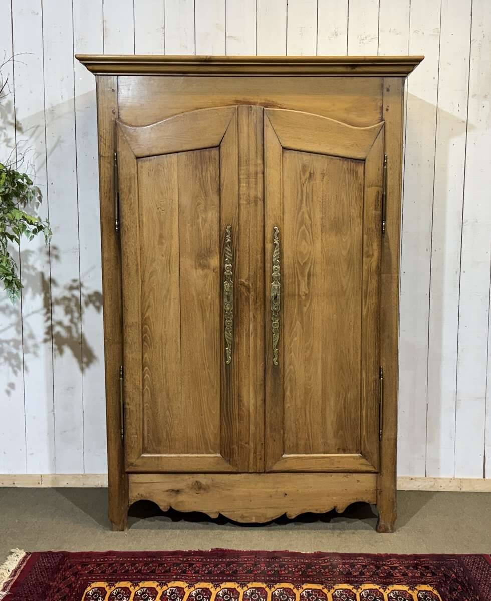 19th-century country wardrobe in blonde chestnut.