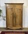 19th-century country wardrobe in blonde chestnut.
