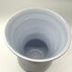 Blue glazed earthenware vase – stylized floral decoration – signed on the base