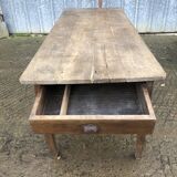 Antique farmhouse table in solid oak with tapered legs and 1 drawer at the end.