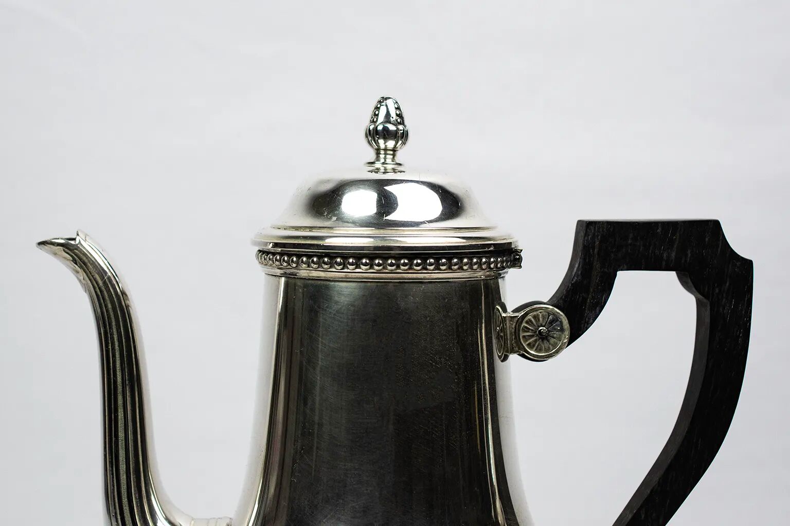 Silver-plated metal coffee pot Ercuis — decorated with bead friezes, ebony handle.