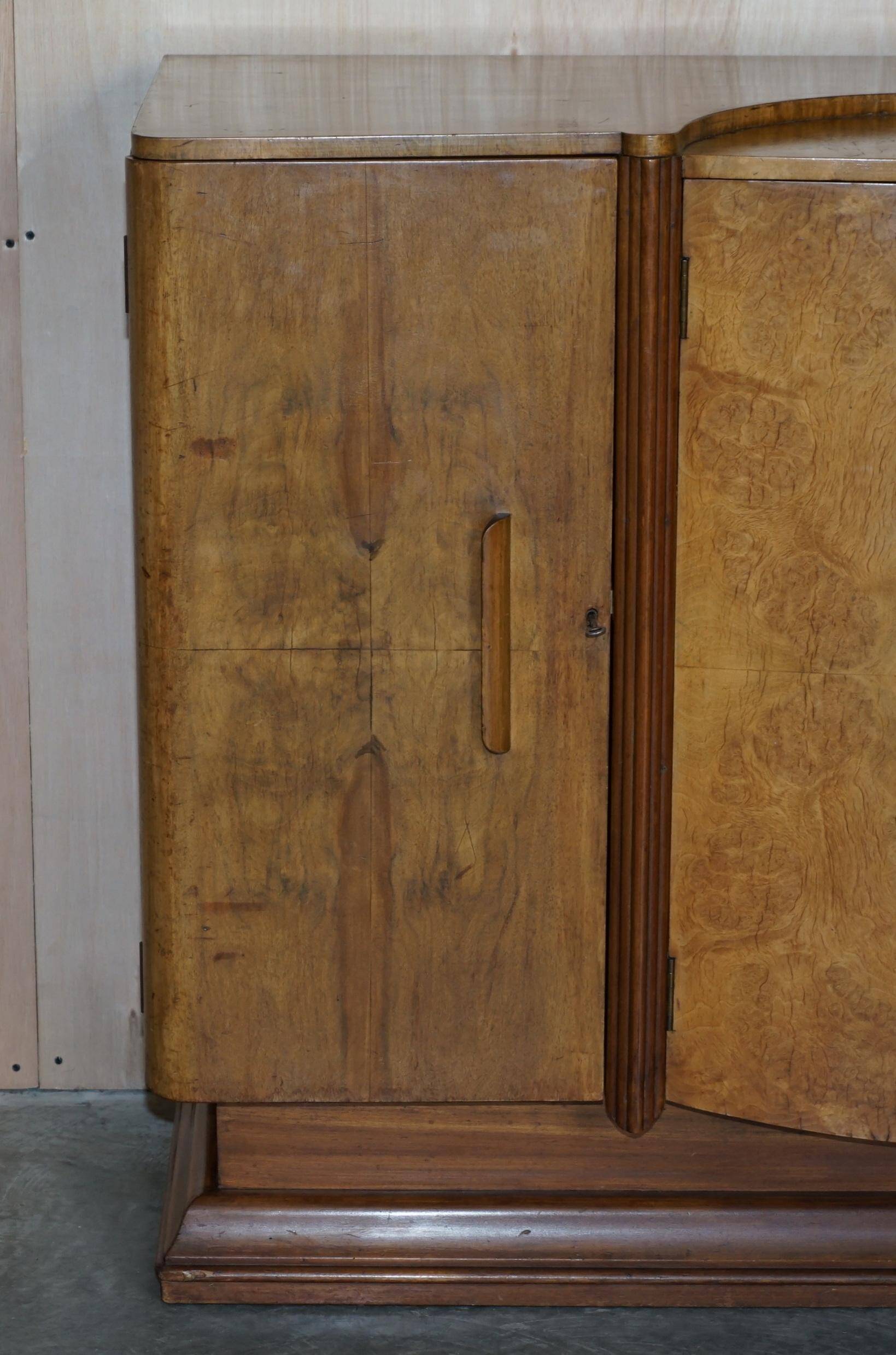 Art Deco walnut burr sideboard with drawers and bar.