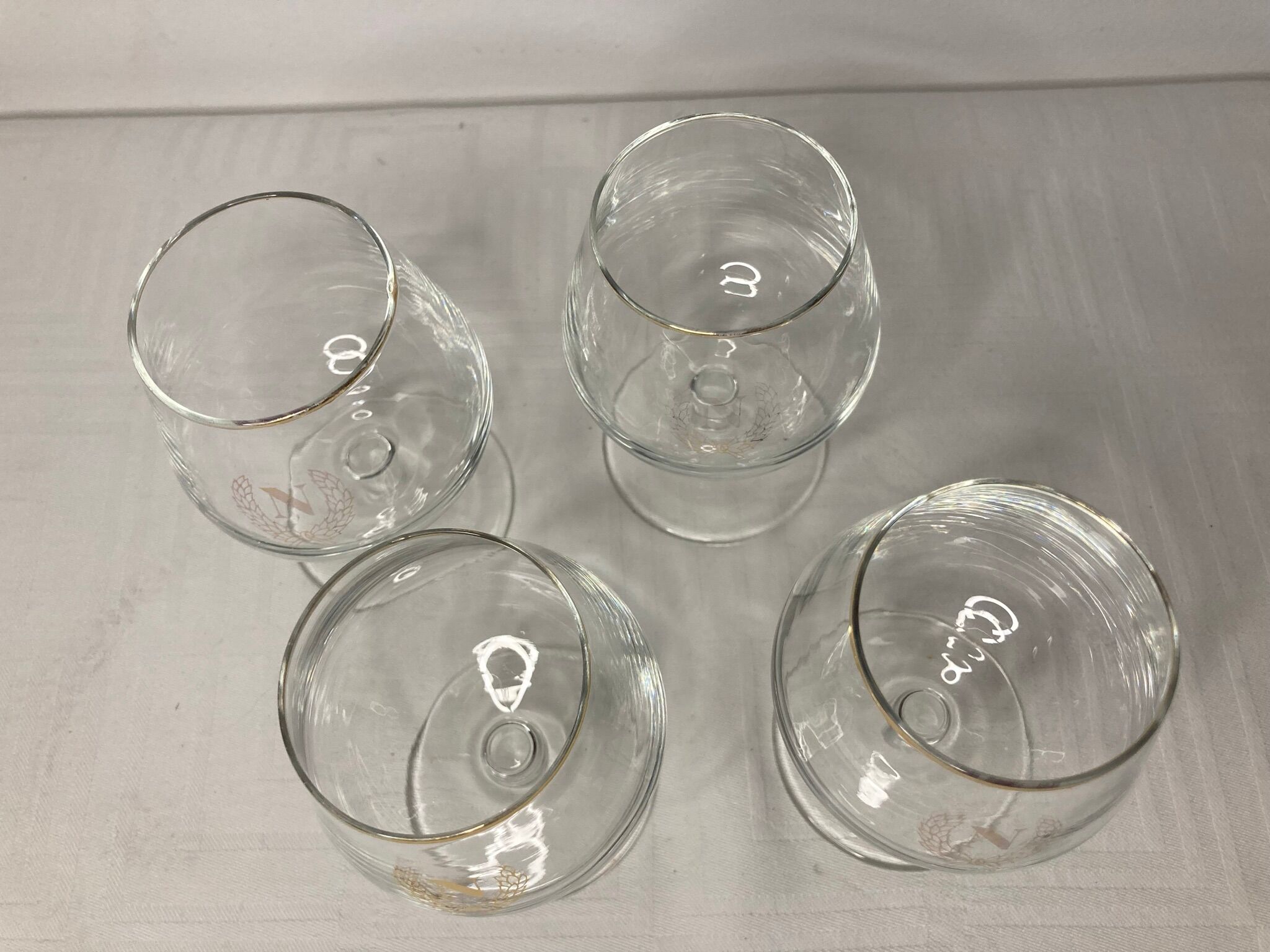 Série de quatre verres à cognac fine Napoléon