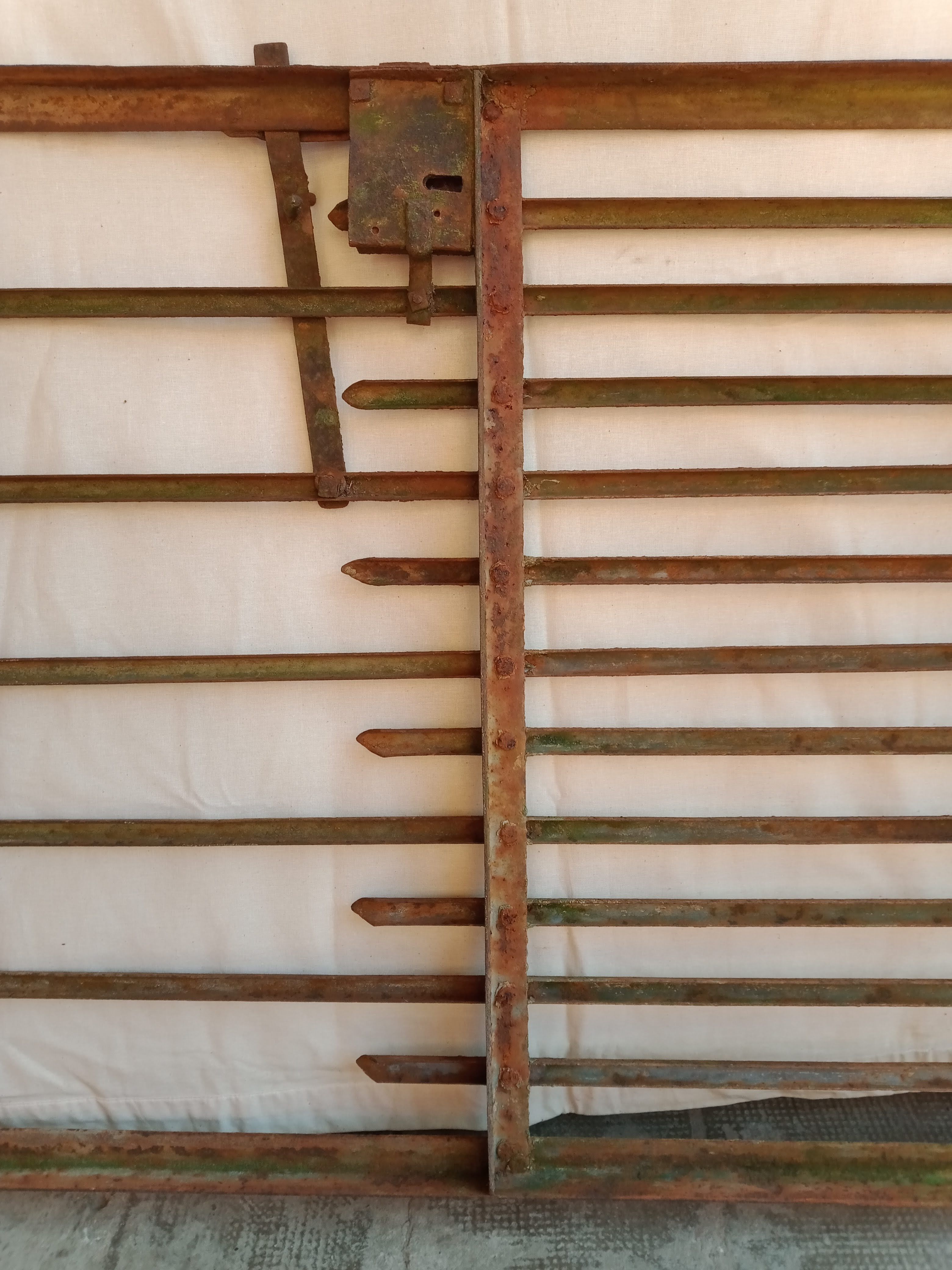 Old riveted metal gate