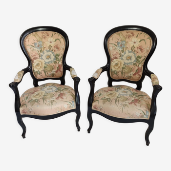 Pair of Napoleon III period armchairs in blackened wood