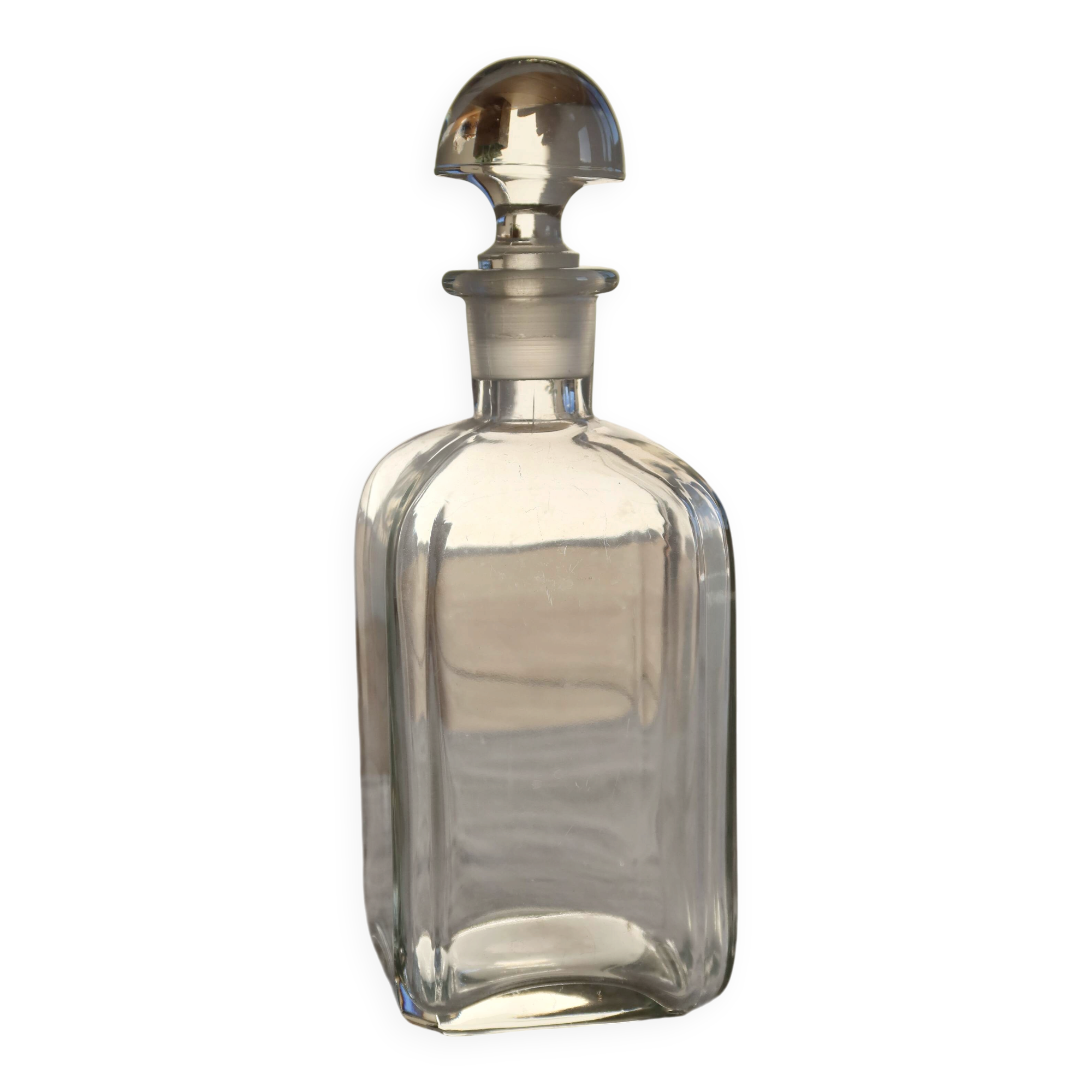 Antique glass carafe with stopper