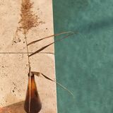 Conical vase in amber glass