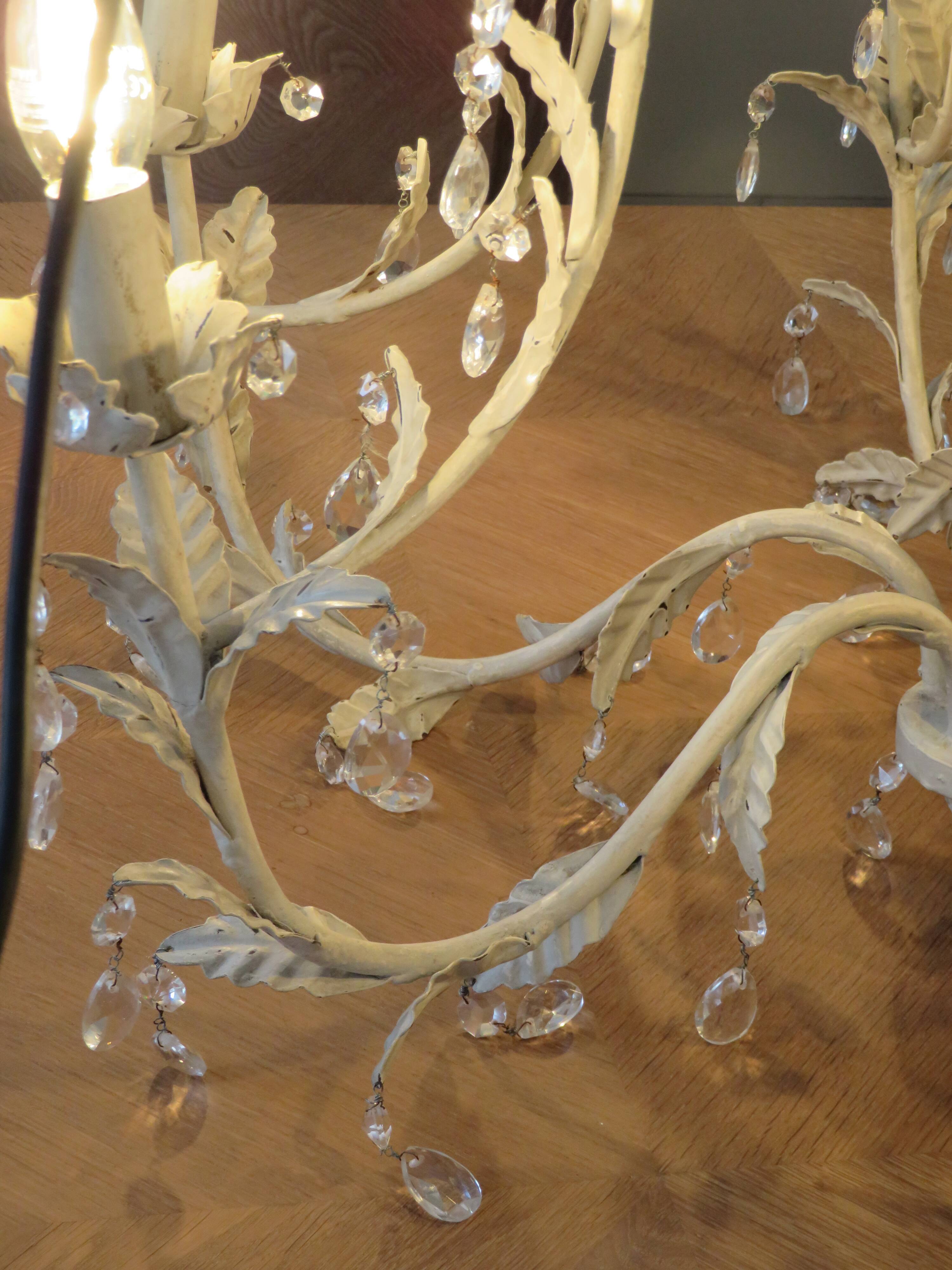 Large cage chandelier in aged metal.