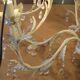 Large cage chandelier in aged metal.