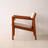 Upholstered armchair with teak frame
