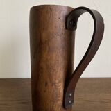 Mountain pitcher in monoxile wood and leather folk art