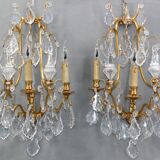 Pair of Louis XVI style gilded bronze & bohemian crystal sconces