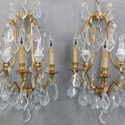 Pair of Louis XVI style gilded bronze & bohemian crystal sconces