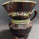 Glazed terracotta pitcher from Savoie, early 20th century