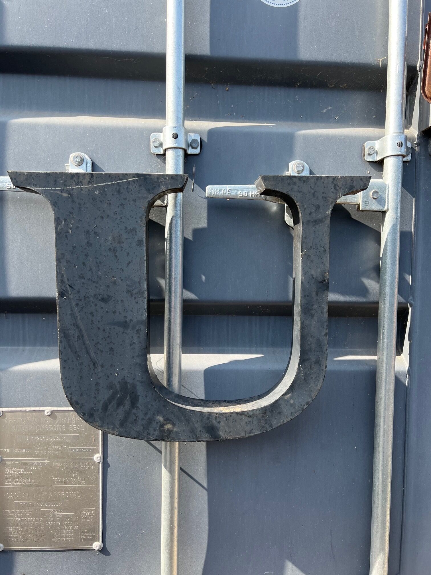 Letter u in galvanized metal